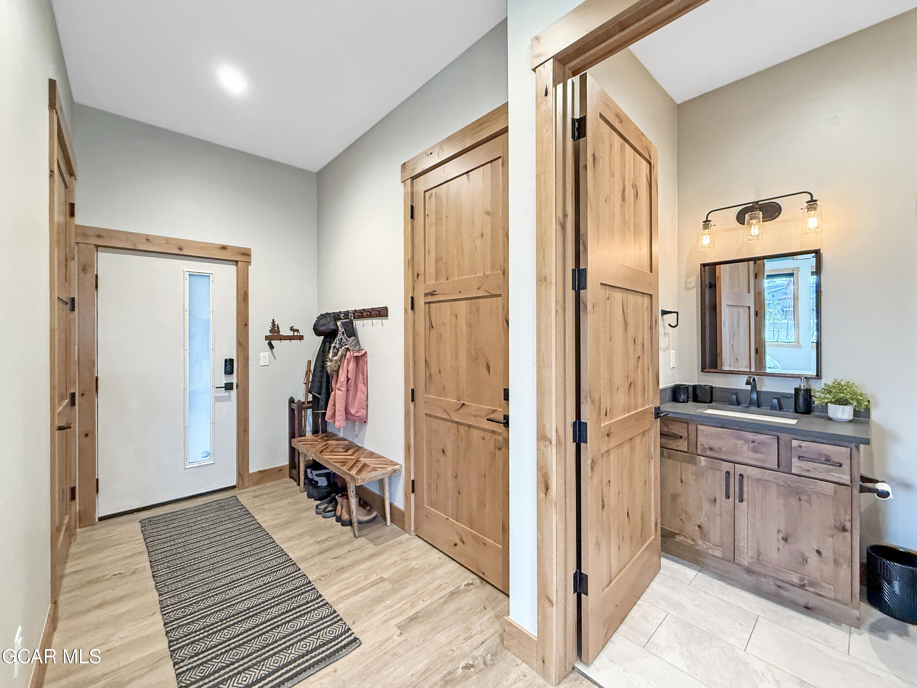 116 Springview Lane, Unit C104 Fraser, CO 80442 - Photo 5 of 45 Entryway & Bathroom #1