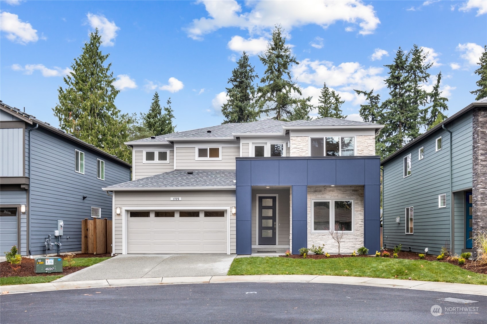 111 177th Street Southeast Bothell, WA 98012 - Photo 1 of 34 a front view of a house with a garden and trees