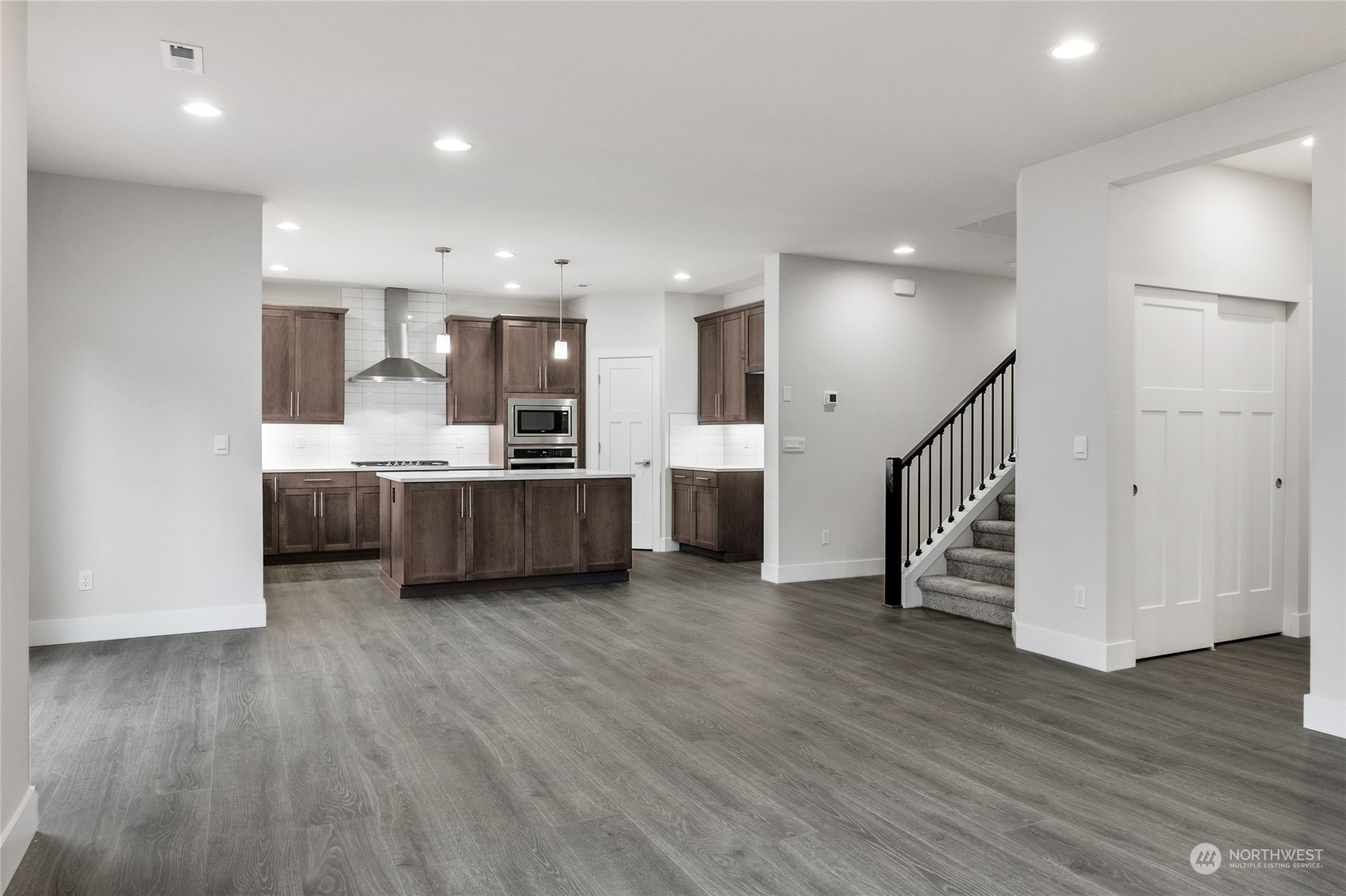 111 177th Street Southeast Bothell, WA 98012 - Photo 15 of 34 a view of kitchen with wooden floor and electronic appliances