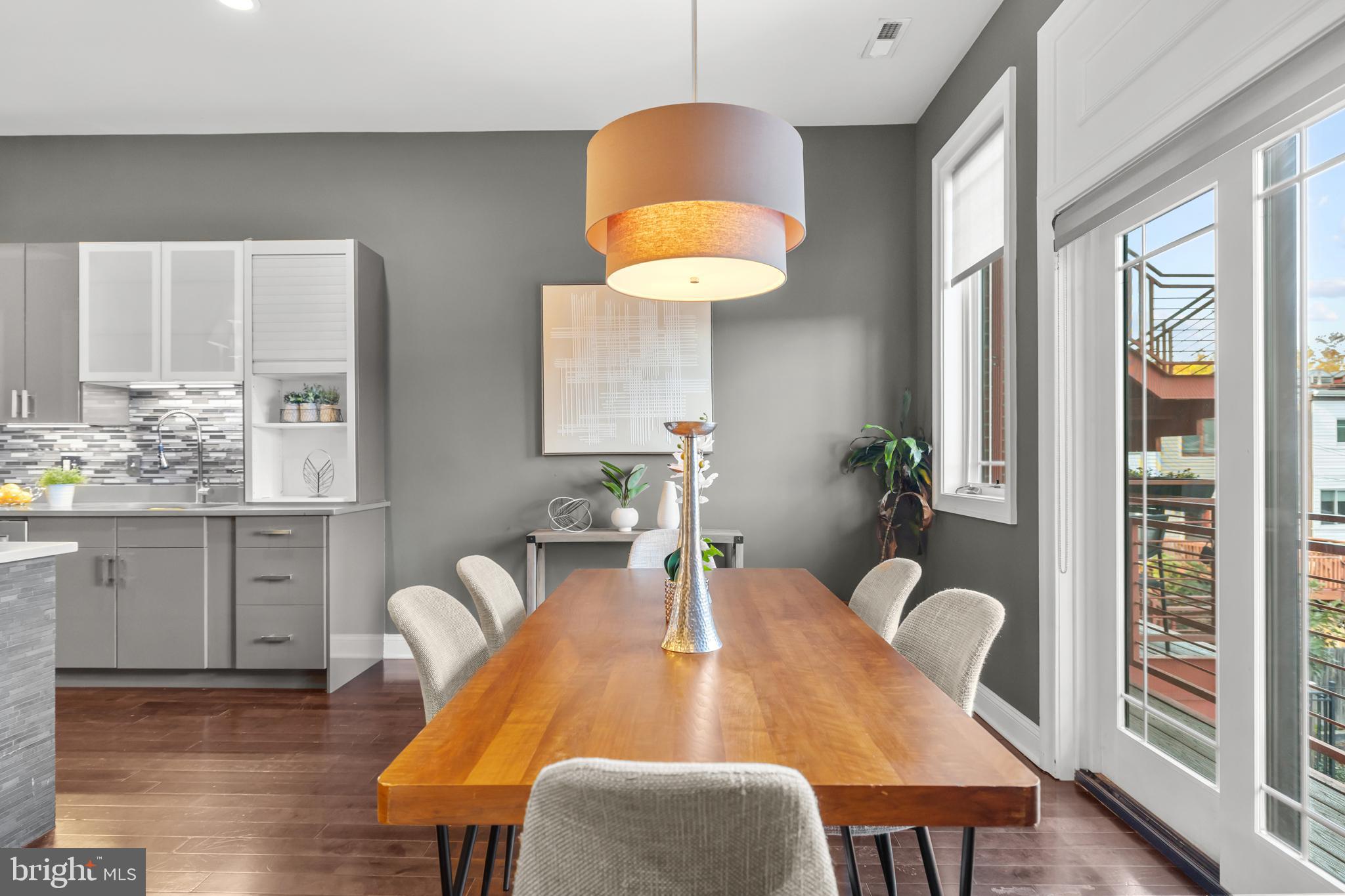 151 V Street Northwest, Unit 4 Washington, DC 20001 - Photo 20 of 49 a dining room with furniture and wooden floor