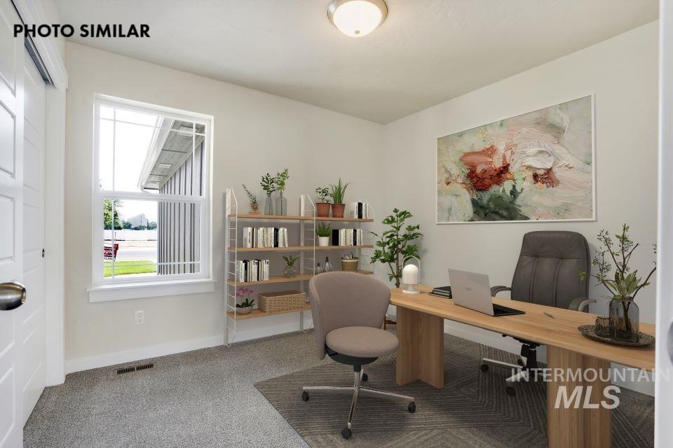 1652 Haystack Road Emmett, ID 83617 - Photo 20 of 29 Spacious room featuring light-colored walls, ceiling-mounted lighting, and a window with white framing