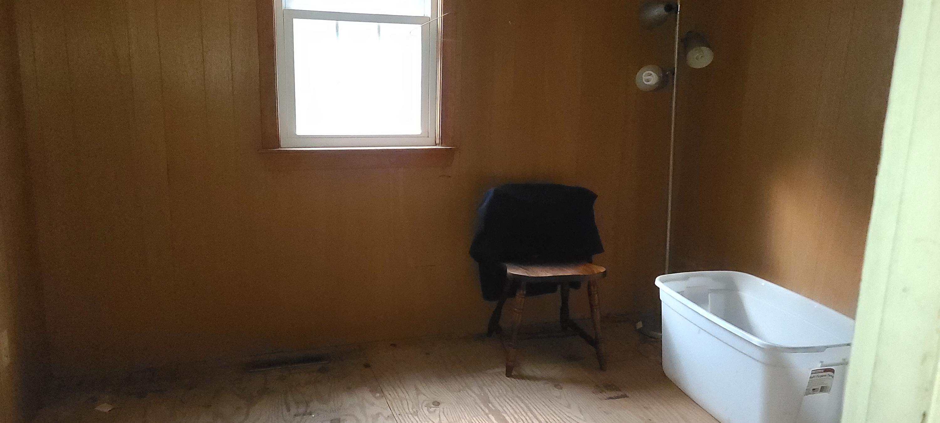 190 River Road Marstons Mills, MA 02648 - Photo 14 of 29 a bathroom with a toilet chair and a window