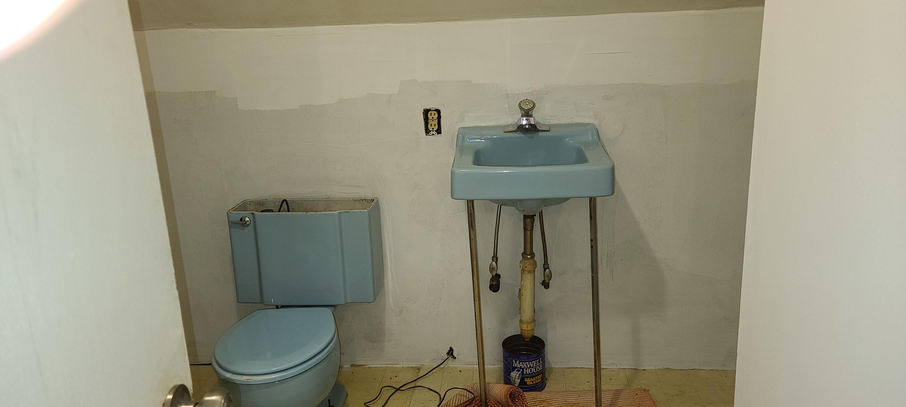 190 River Road Marstons Mills, MA 02648 - Photo 19 of 29 a bathroom with a toilet sink and mirror