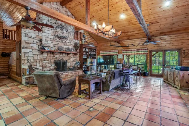a view of a patio with table and chairs