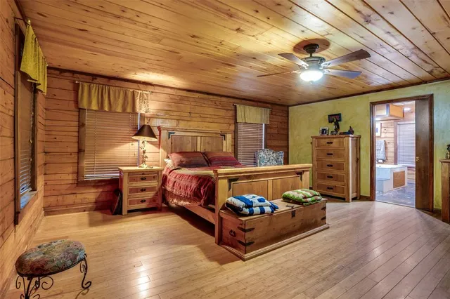 a bathroom with a sink double vanity granite and a mirror