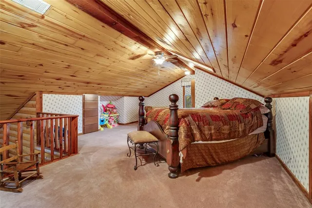 a bathroom with a sink a mirror and shower