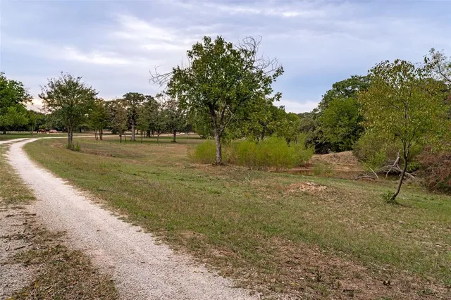 a view of a lake with a big yard