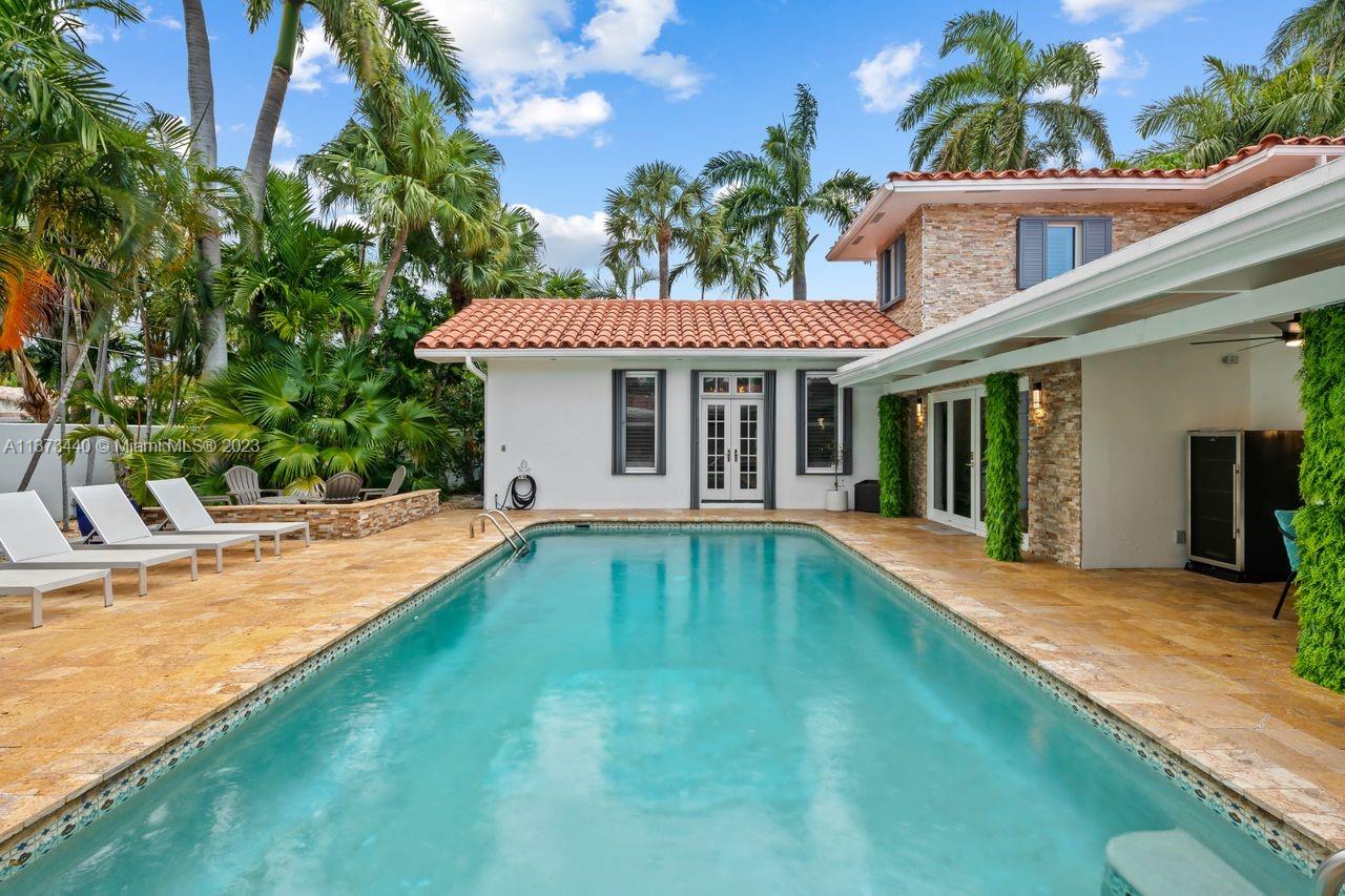 1401 South Ocean Drive Fort Lauderdale, FL 33316 - Photo 15 of 26 a view of a house with swimming pool