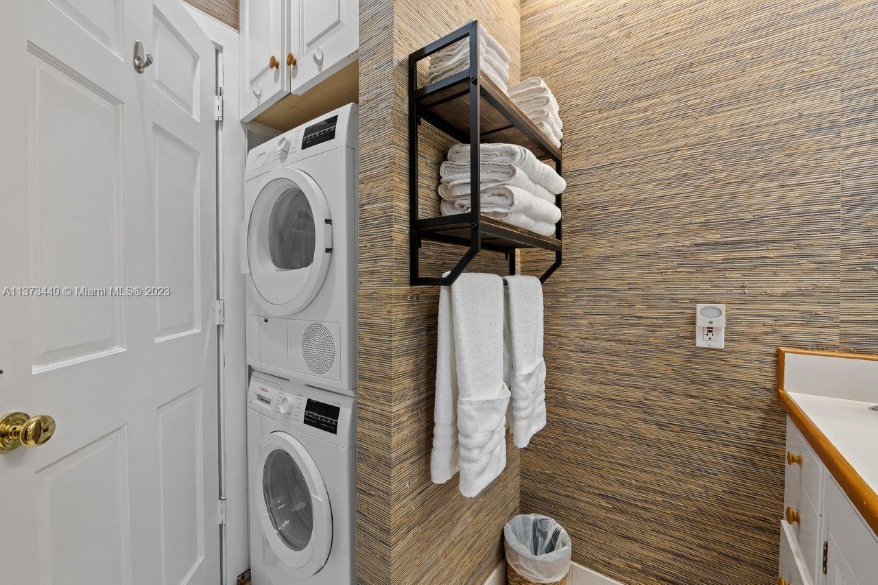 1401 South Ocean Drive Fort Lauderdale, FL 33316 - Photo 22 of 26 a utility room with dryer and washer