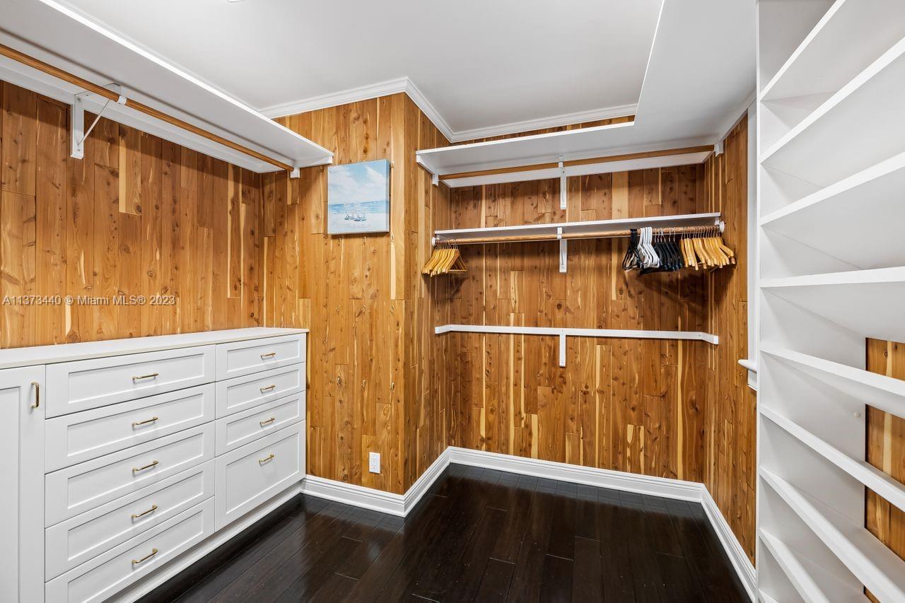 1401 South Ocean Drive Fort Lauderdale, FL 33316 - Photo 24 of 26 a view of walk in closet with empty racks