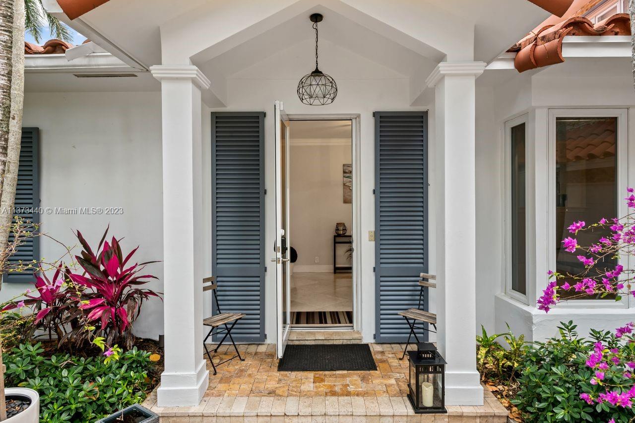1401 South Ocean Drive Fort Lauderdale, FL 33316 - Photo 6 of 26 a front view of a house with a potted plant
