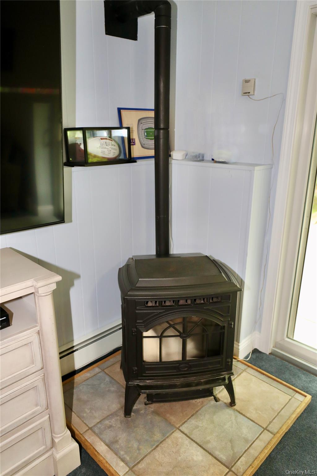 7 David Road Somers, NY 10589 - Photo 39 of 41 Lower level wood burning stove