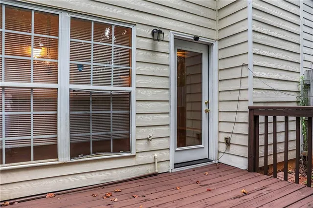 a view of a house with a large window