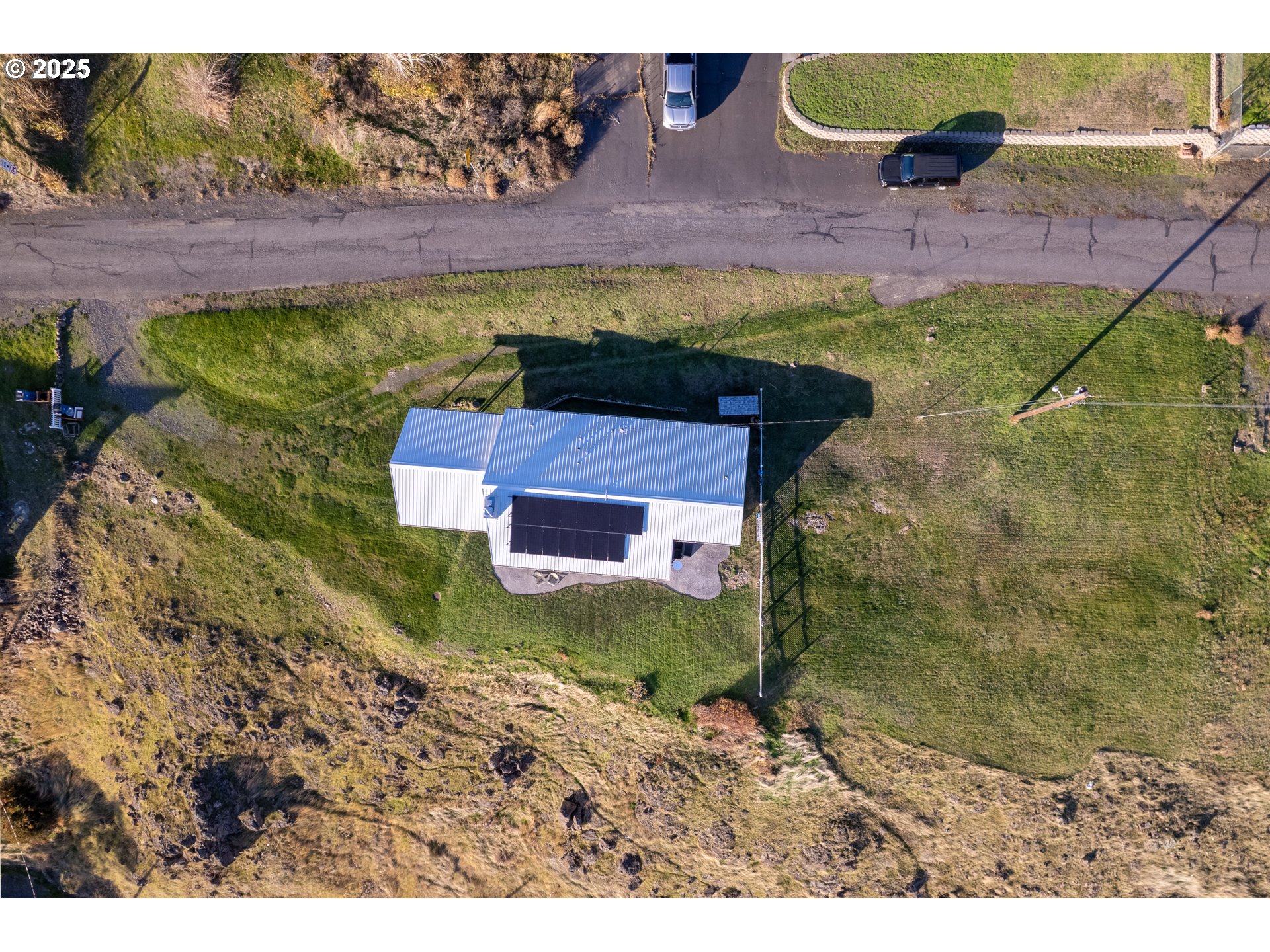 350 Bluff Road Wishram, WA 98673 - Photo 32 of 36 a aerial view of a house with a yard