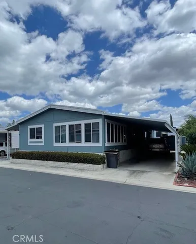 a house view with a garden space