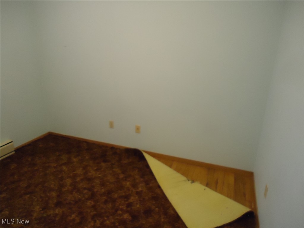539 East Nimisila Road Uniontown, OH 44685 - Photo 34 of 41 View of carpeted empty room