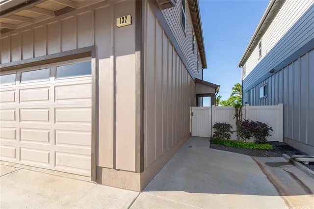 a view of a house with a street