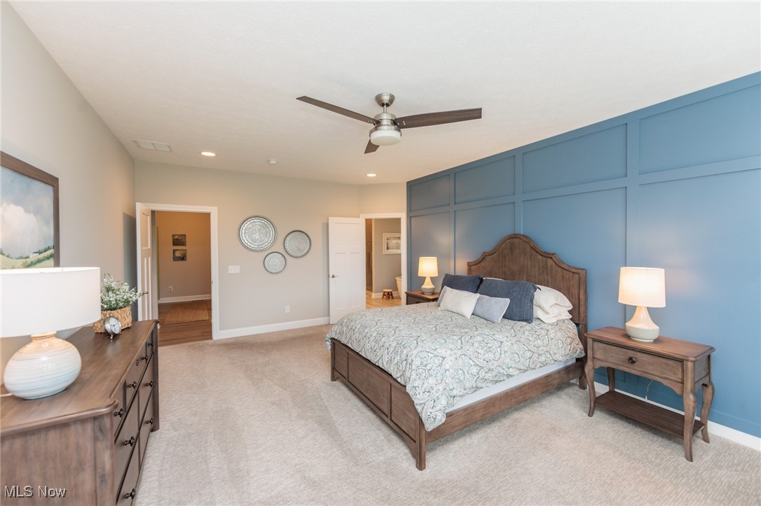 2041 Jaycox Road Avon, OH 44011 - Photo 29 of 50 Bedroom with a decorative wall, light carpet, ceiling fan, and recessed lighting