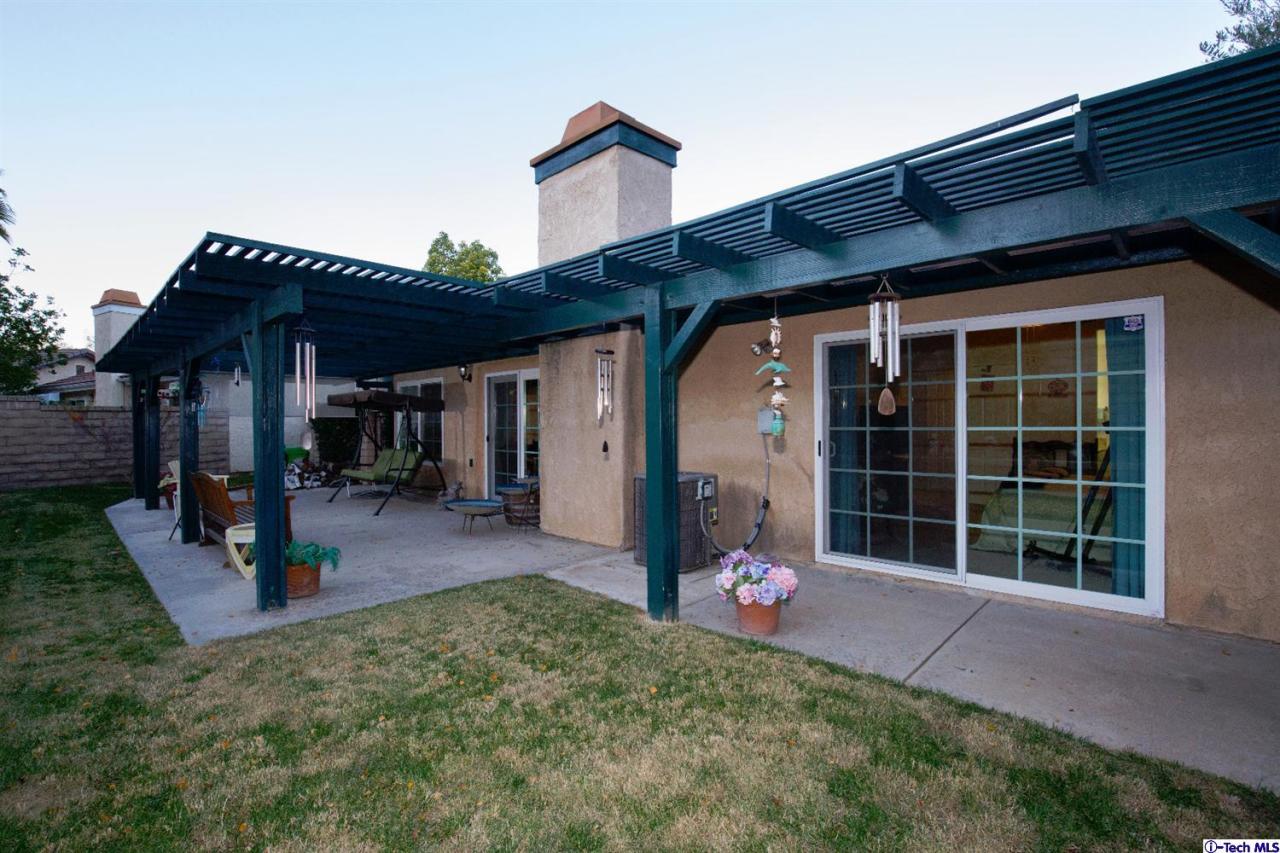 25633 Salceda Road Valencia, CA 91355 - Photo 15 of 29 front view of a house with a porch