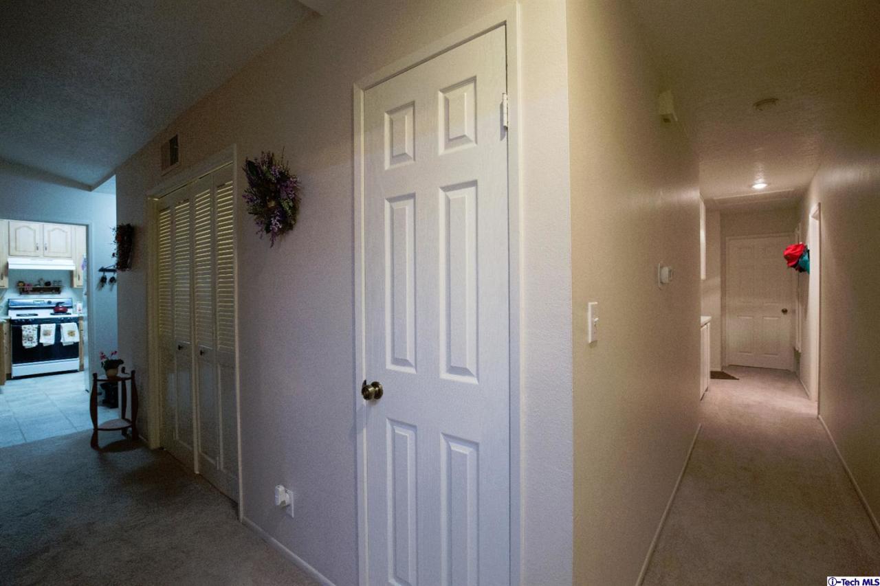 25633 Salceda Road Valencia, CA 91355 - Photo 16 of 29 a view of a hallway with closet and a livingroom view