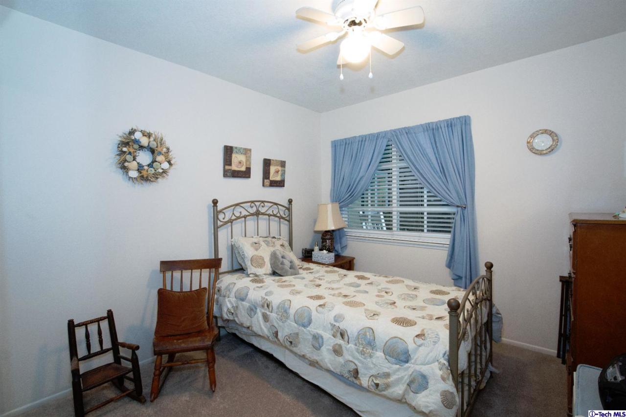 25633 Salceda Road Valencia, CA 91355 - Photo 25 of 29 a bedroom with a bed and a window