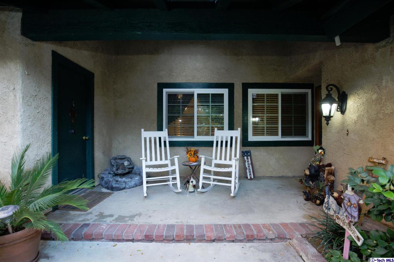 25633 Salceda Road Valencia, CA 91355 - Photo 4 of 29 a view of a house with backyard and sitting area