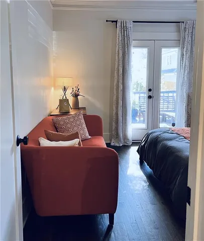 a bedroom with bed and window