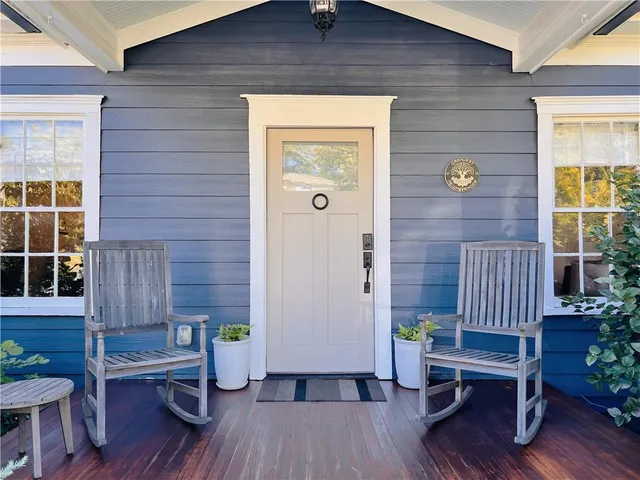a view of wooden door in a house