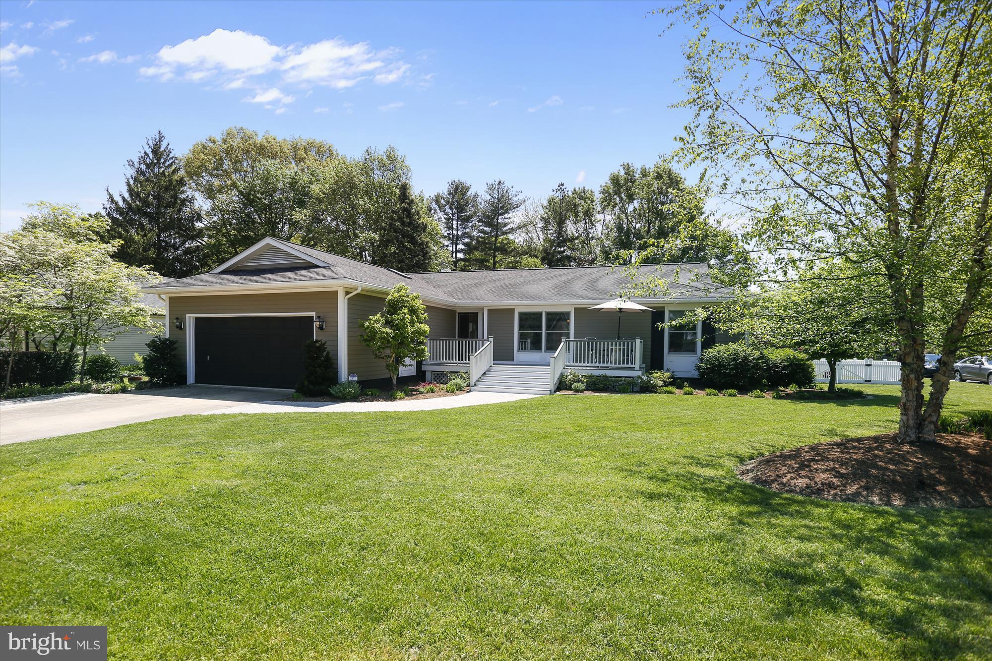 100 Birch Run Road Chestertown, MD 21620 - Photo 1 of 30 a front view of a house with a garden and porch