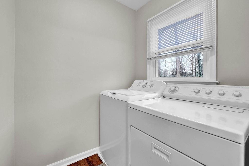 3091 Clifton Road Southeast Smyrna, GA 30080 - Photo 16 of 36 a utility room with dryer and window