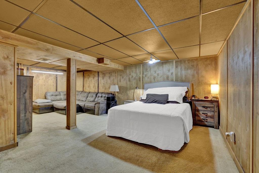 3091 Clifton Road Southeast Smyrna, GA 30080 - Photo 32 of 36 a spacious bedroom with a bed and glass door