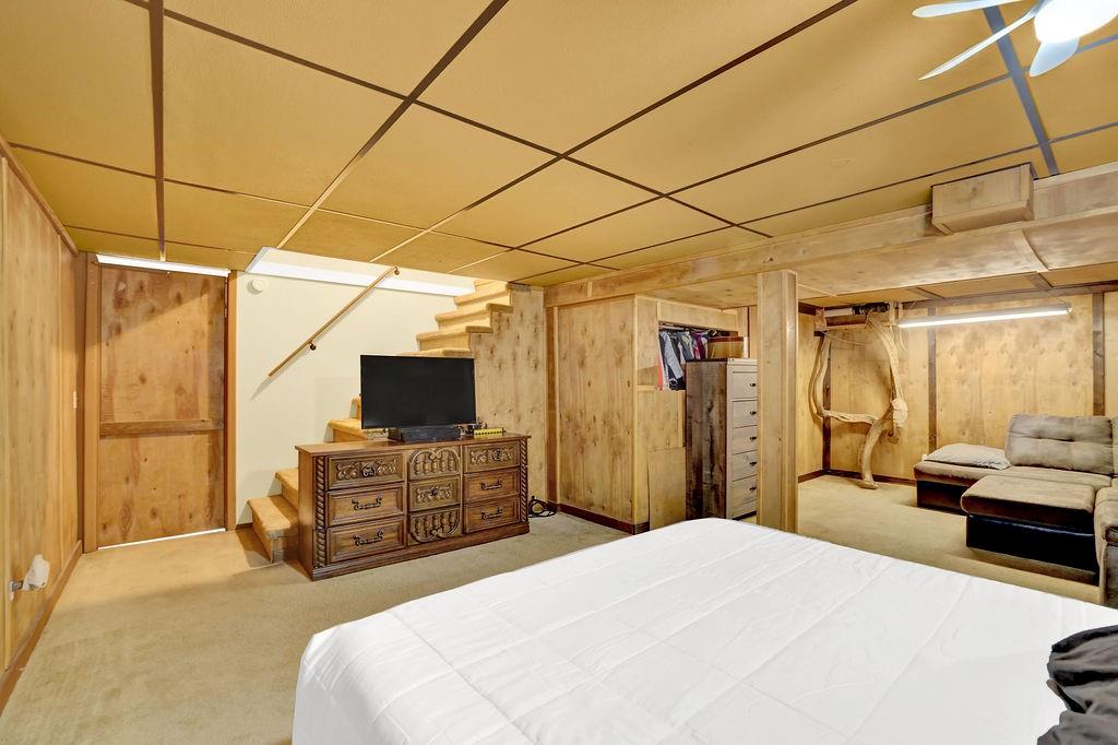 3091 Clifton Road Southeast Smyrna, GA 30080 - Photo 33 of 36 a bedroom with a bed and a flat screen tv