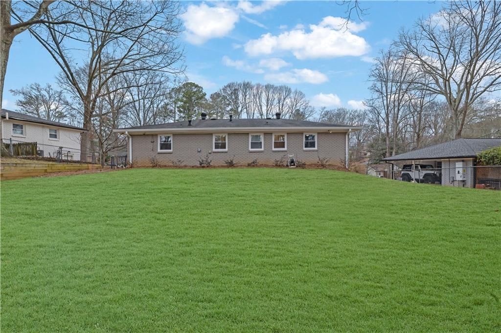 3091 Clifton Road Southeast Smyrna, GA 30080 - Photo 35 of 36 a view of a house with a yard