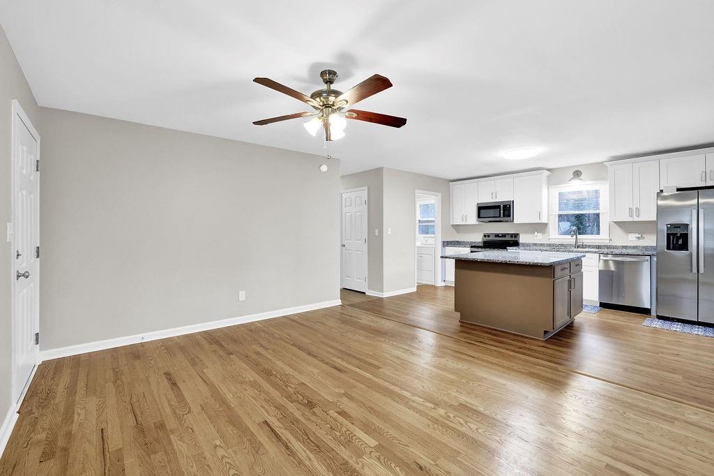 3091 Clifton Road Southeast Smyrna, GA 30080 - Photo 7 of 36 a view of kitchen with granite countertop cabinets and refrigerator