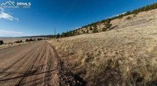 a view of a large body of water with a building in the background