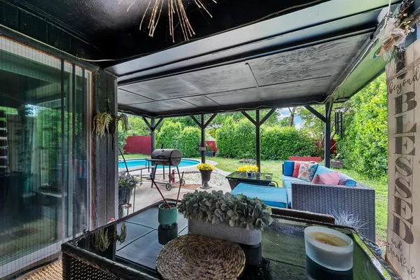 a outdoor living space with furniture and a garden
