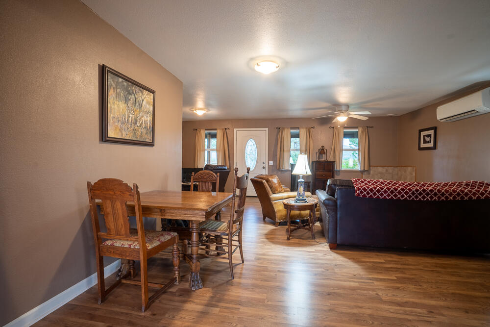 4579 Winnetka Road White City, OR 97503 - Photo 2 of 28 a view of a livingroom with furniture and a wooden floor