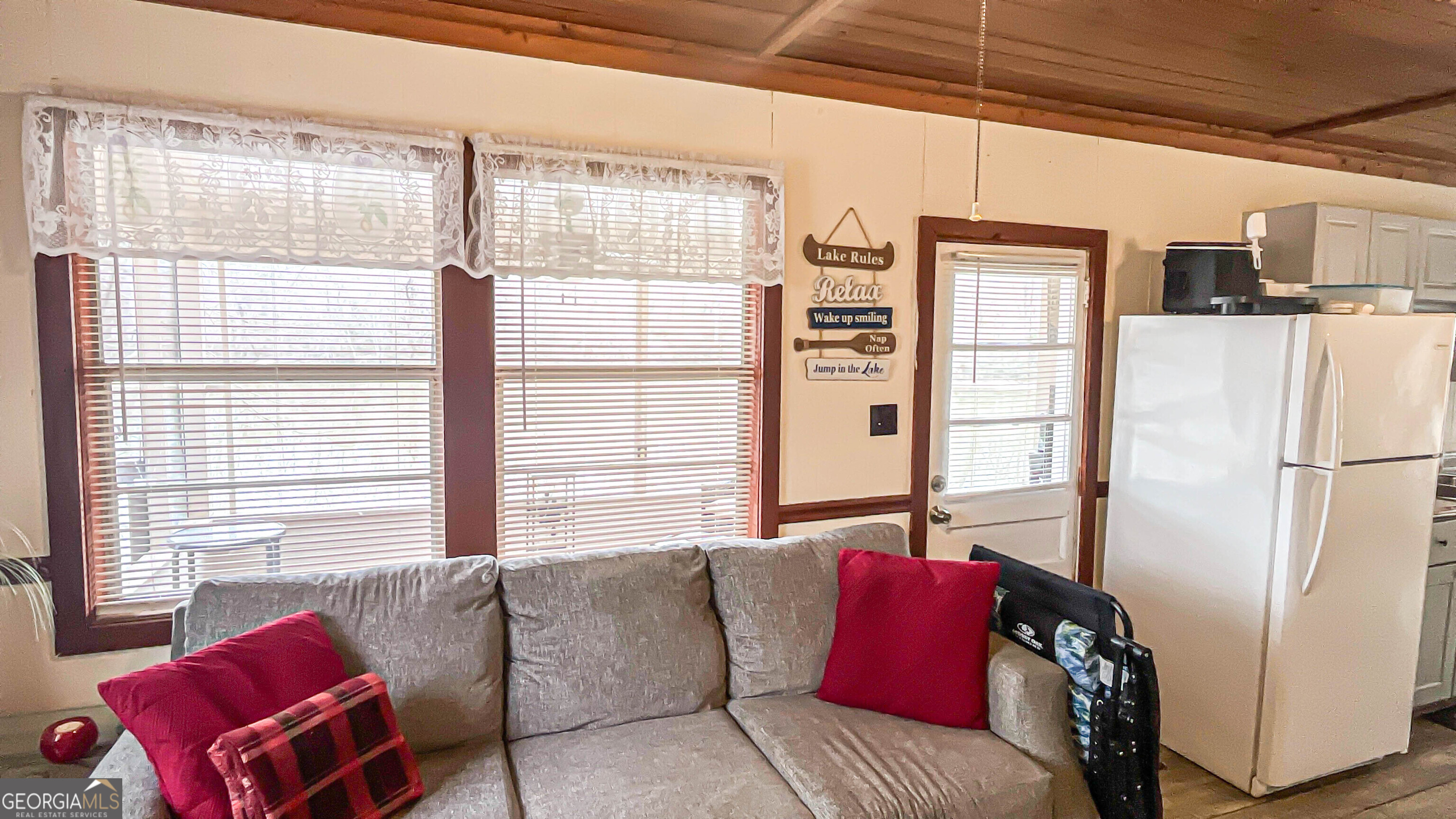 242 Katy Lake Road Jackson, GA 30233 - Photo 17 of 113 a living room with furniture and a window