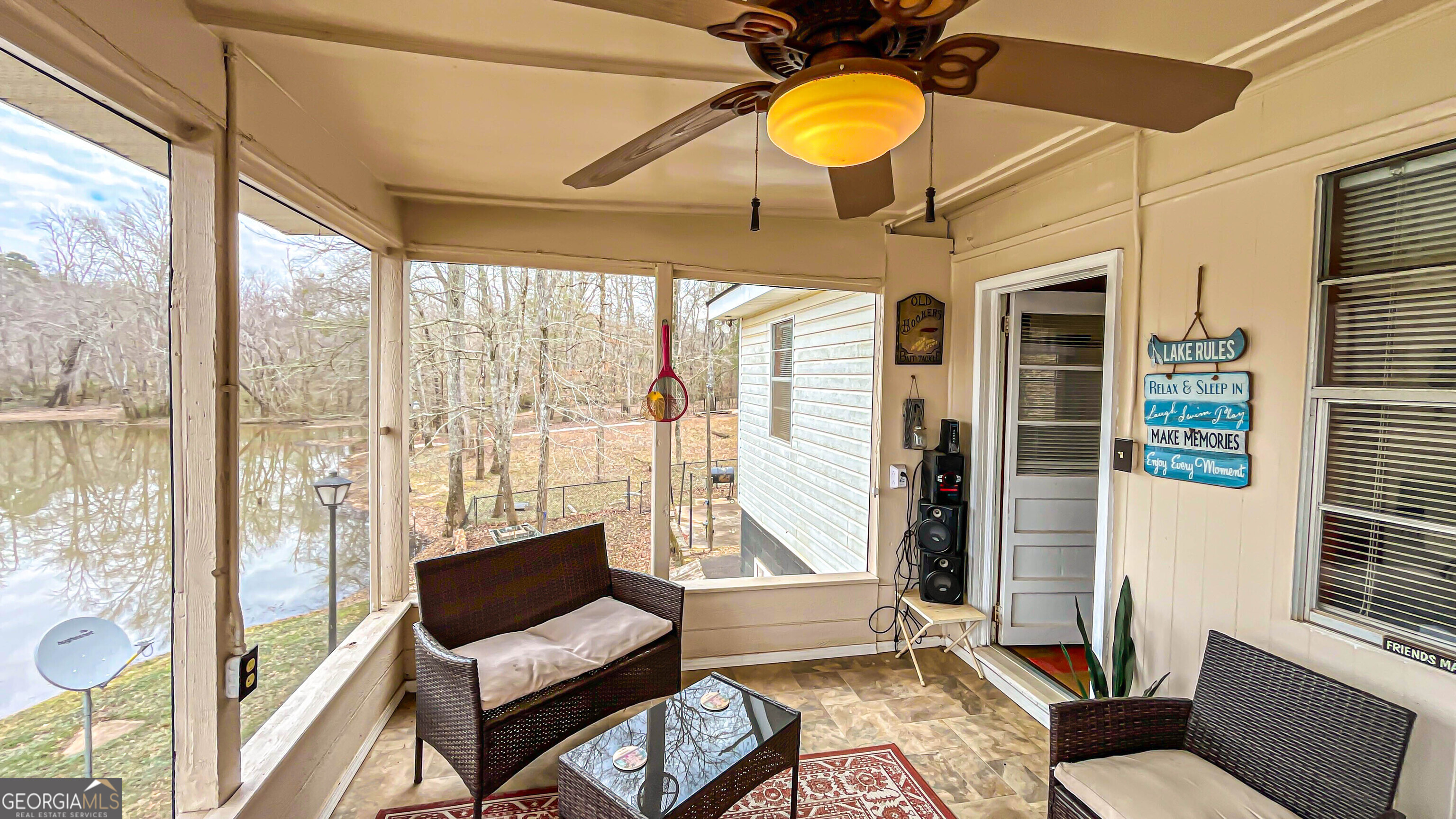 242 Katy Lake Road Jackson, GA 30233 - Photo 46 of 113 a living room with furniture and a window