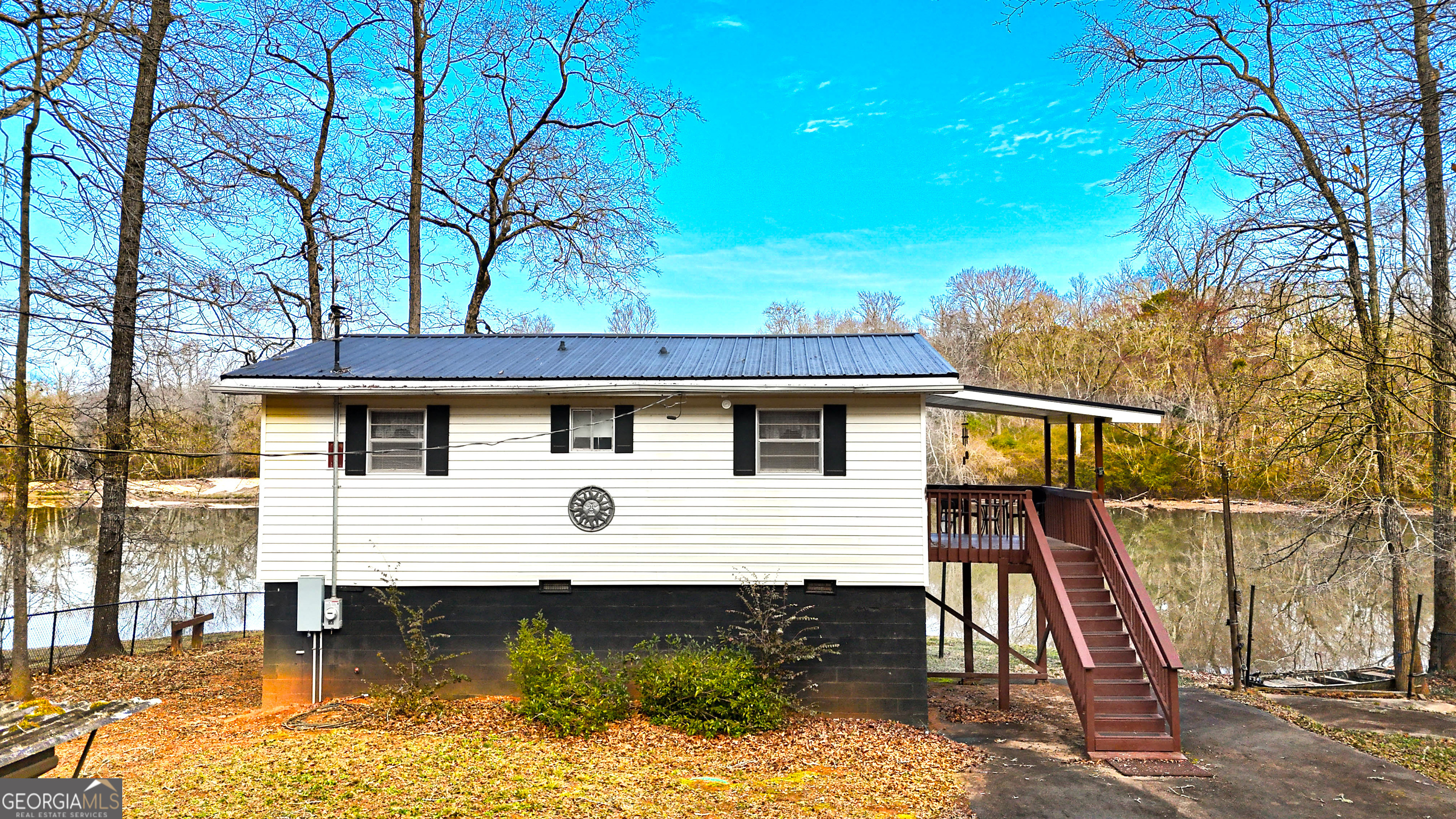 242 Katy Lake Road Jackson, GA 30233 - Photo 49 of 113 a front view of a house with a yard