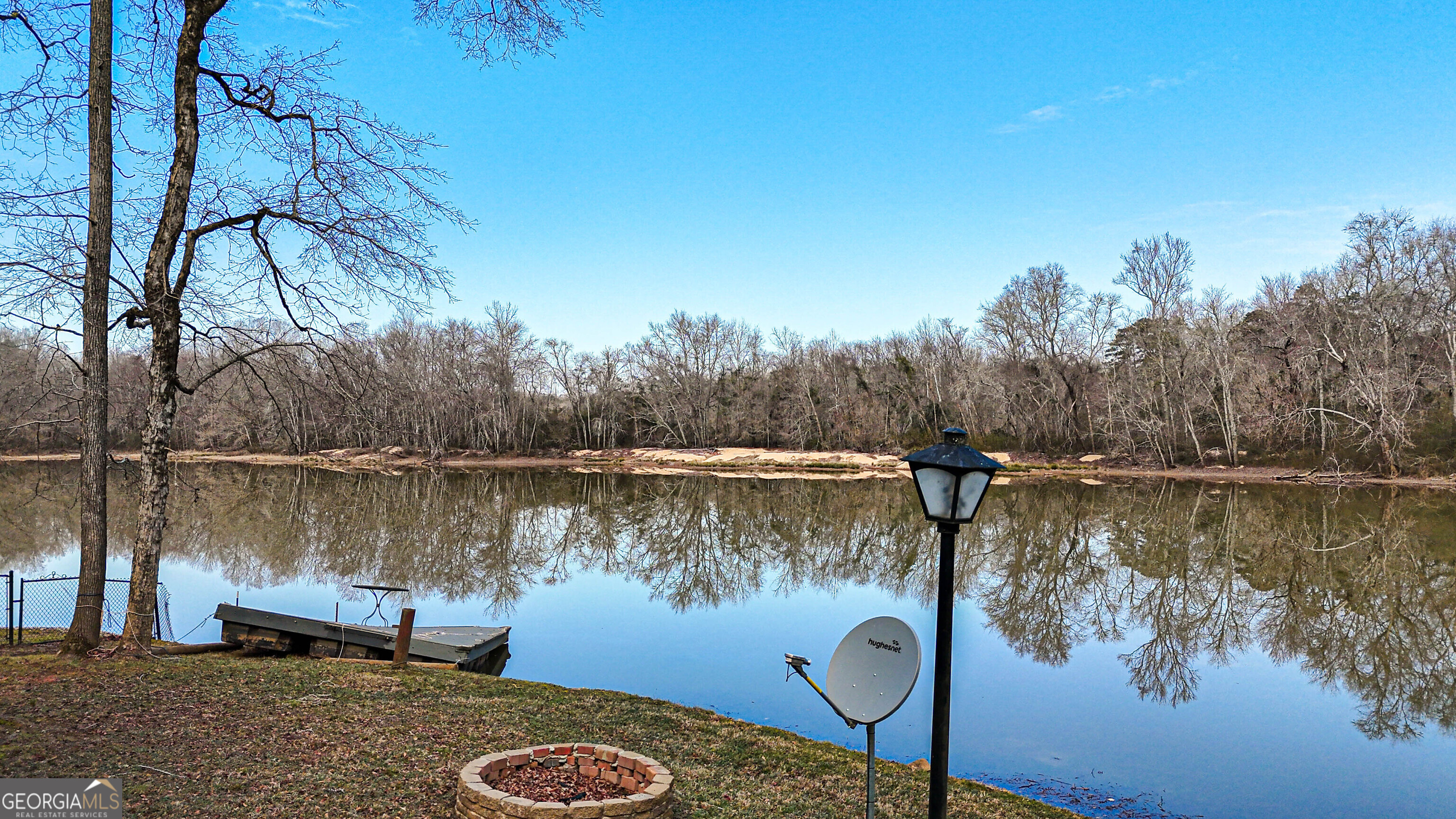 242 Katy Lake Road Jackson, GA 30233 - Photo 57 of 113 a view of a lake in between two chairs