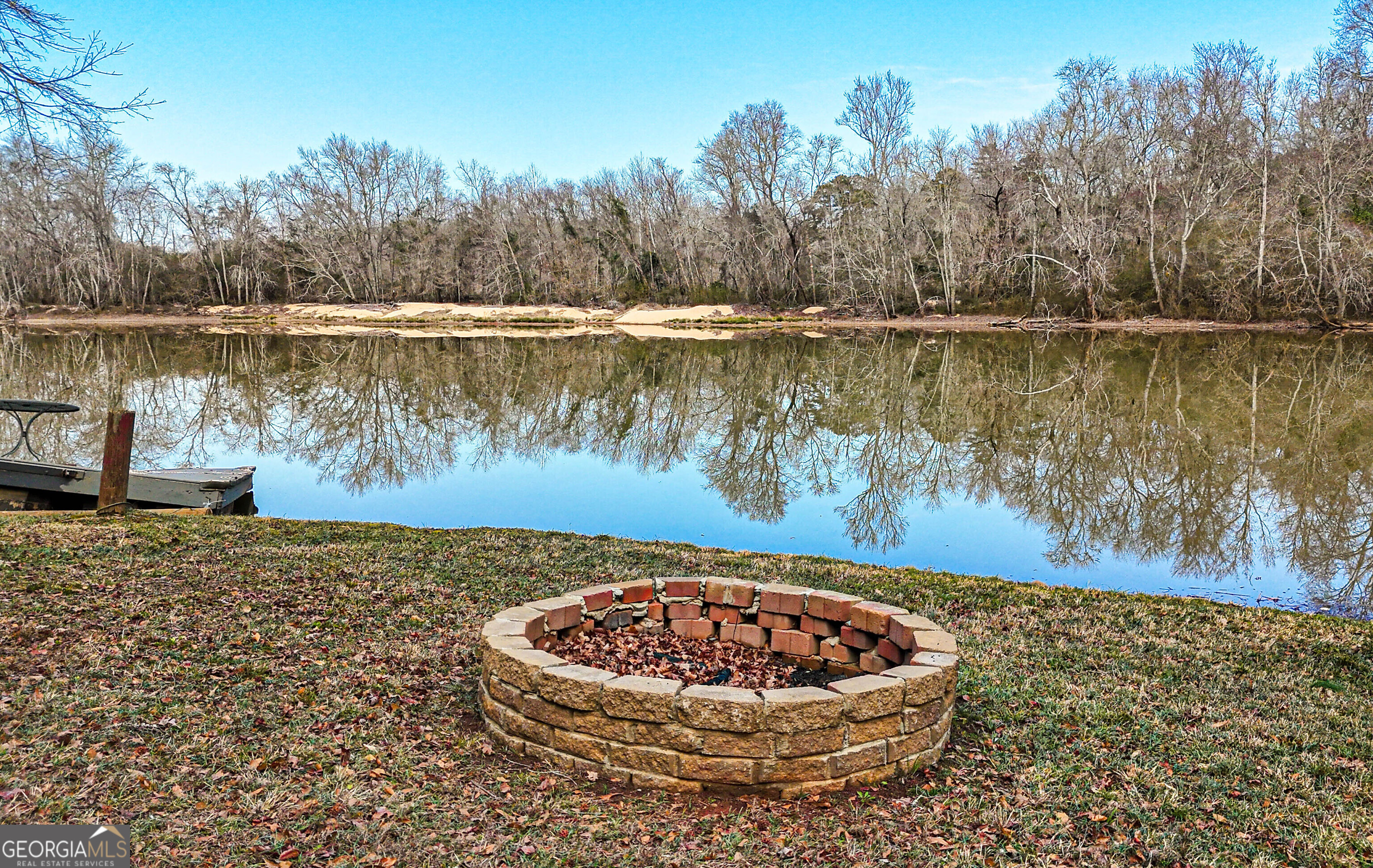 242 Katy Lake Road Jackson, GA 30233 - Photo 59 of 113 a view of a lake with a house in the background