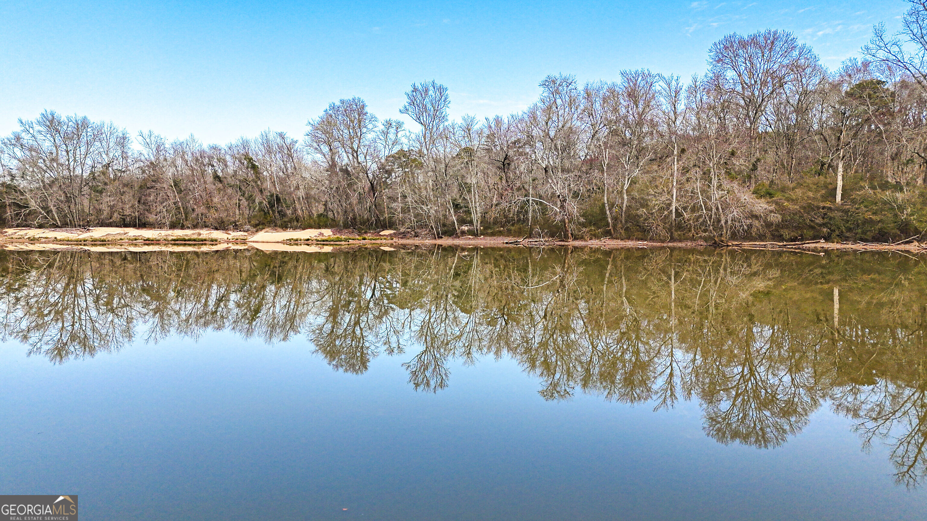 242 Katy Lake Road Jackson, GA 30233 - Photo 61 of 113 a view of a lake with houses in the back