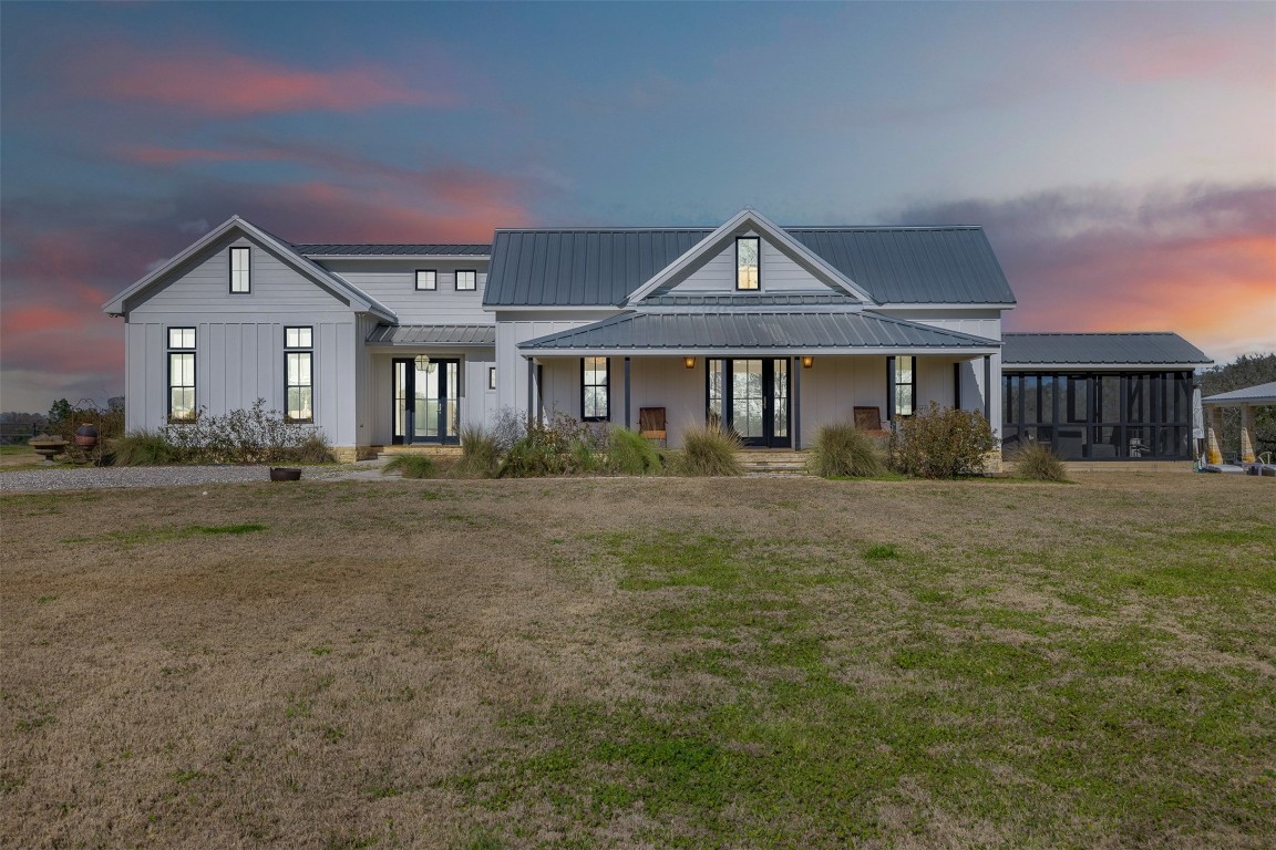 4620 Treybig Loop Fayetteville, TX 78940 - Photo 1 of 24 a front view of a house with a yard