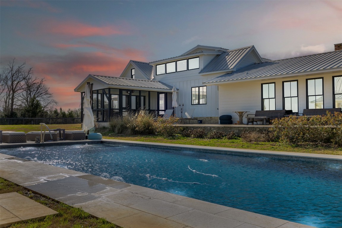 4620 Treybig Loop Fayetteville, TX 78940 - Photo 2 of 24 a view of a house with a swimming pool