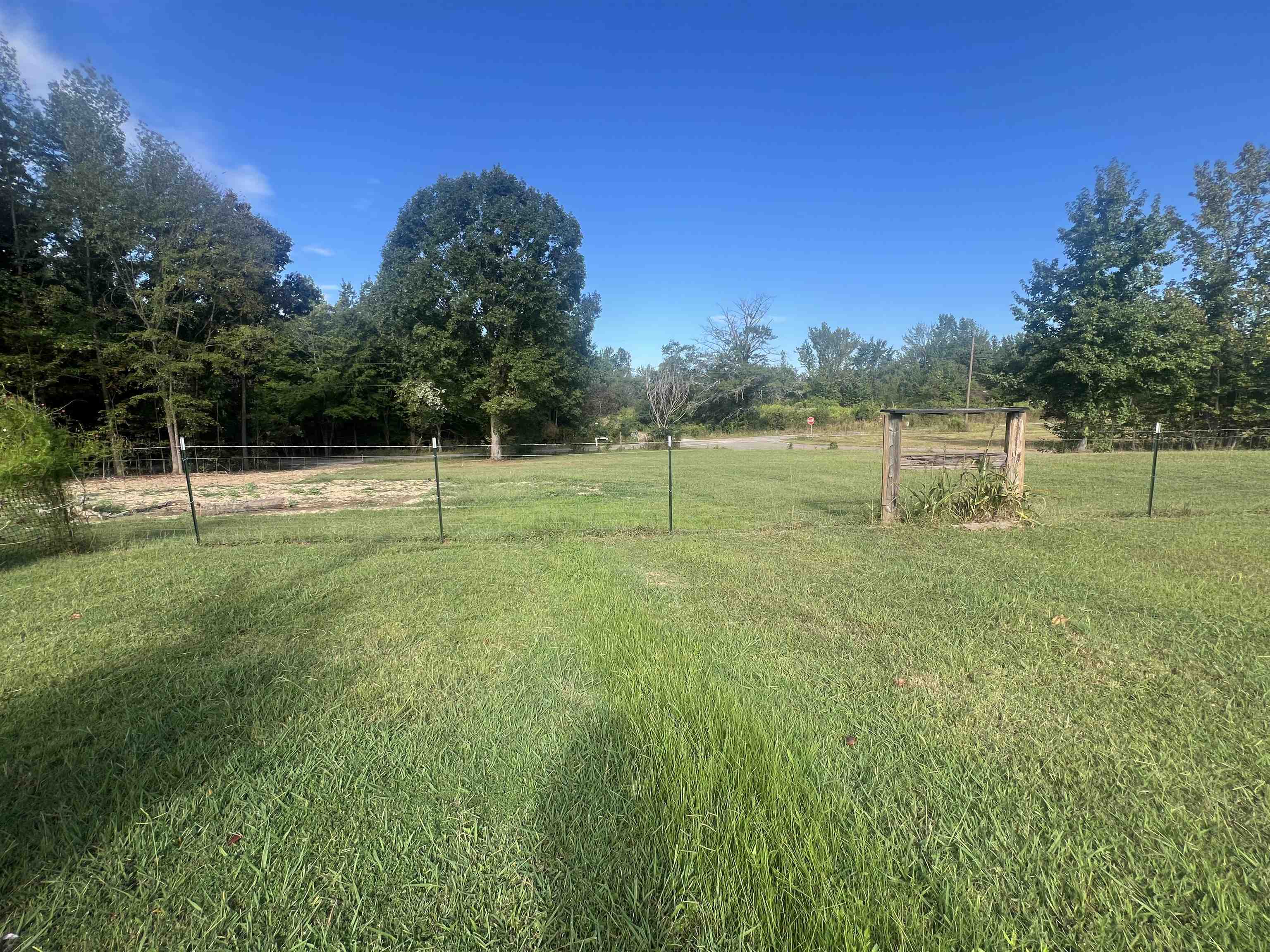 160 Finley Road Adamsville, TN 38310 - Photo 19 of 31 a view of outdoor space with deck and yard