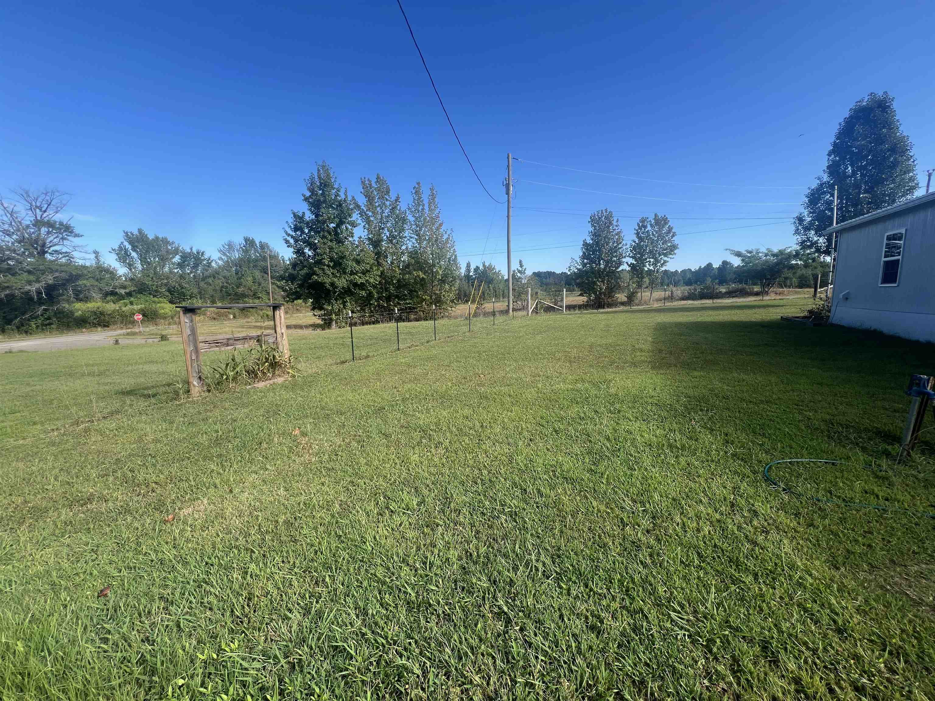 160 Finley Road Adamsville, TN 38310 - Photo 20 of 31 a view of a lake with houses