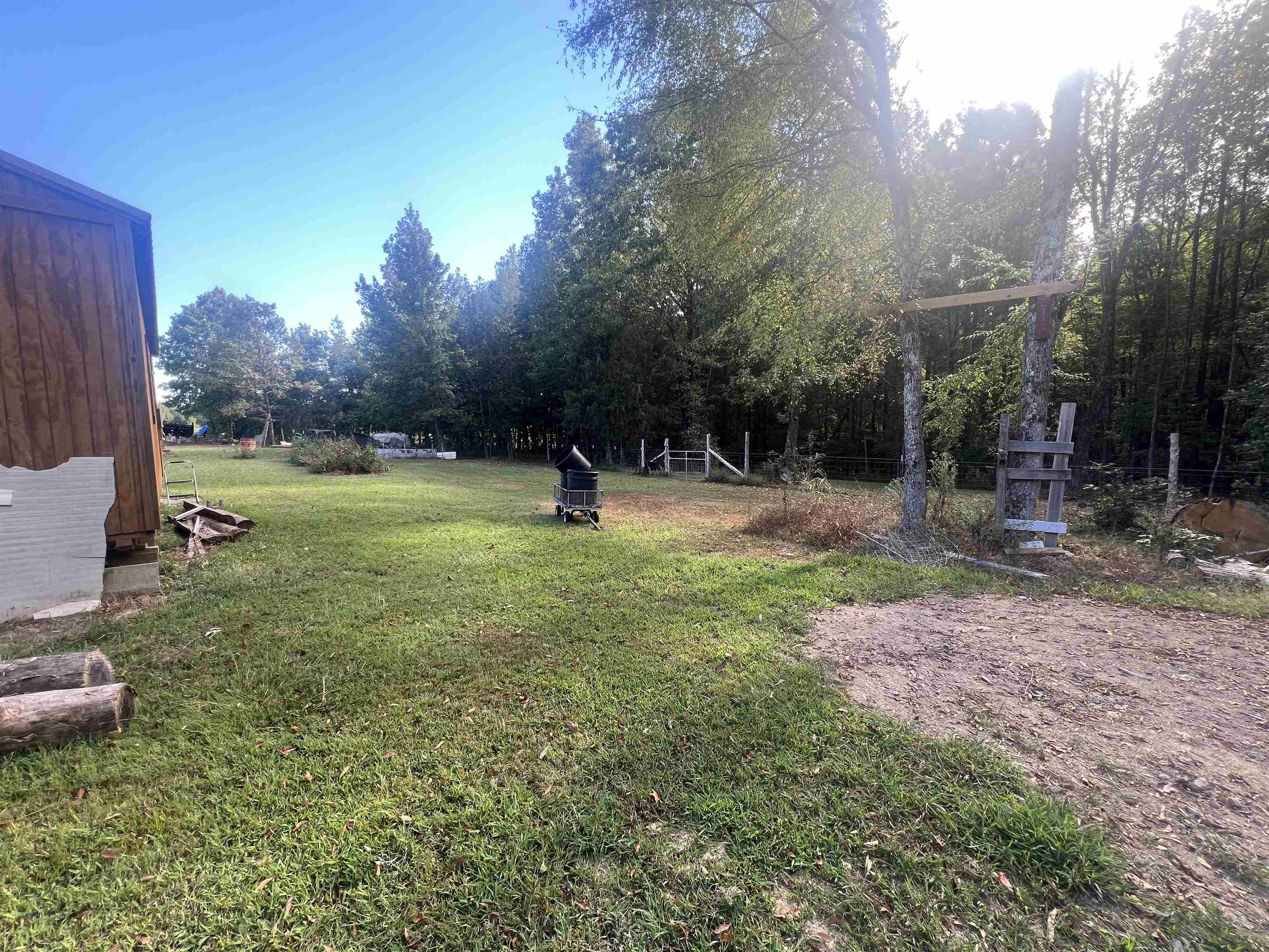 160 Finley Road Adamsville, TN 38310 - Photo 27 of 31 a view of outdoor space with deck and yard