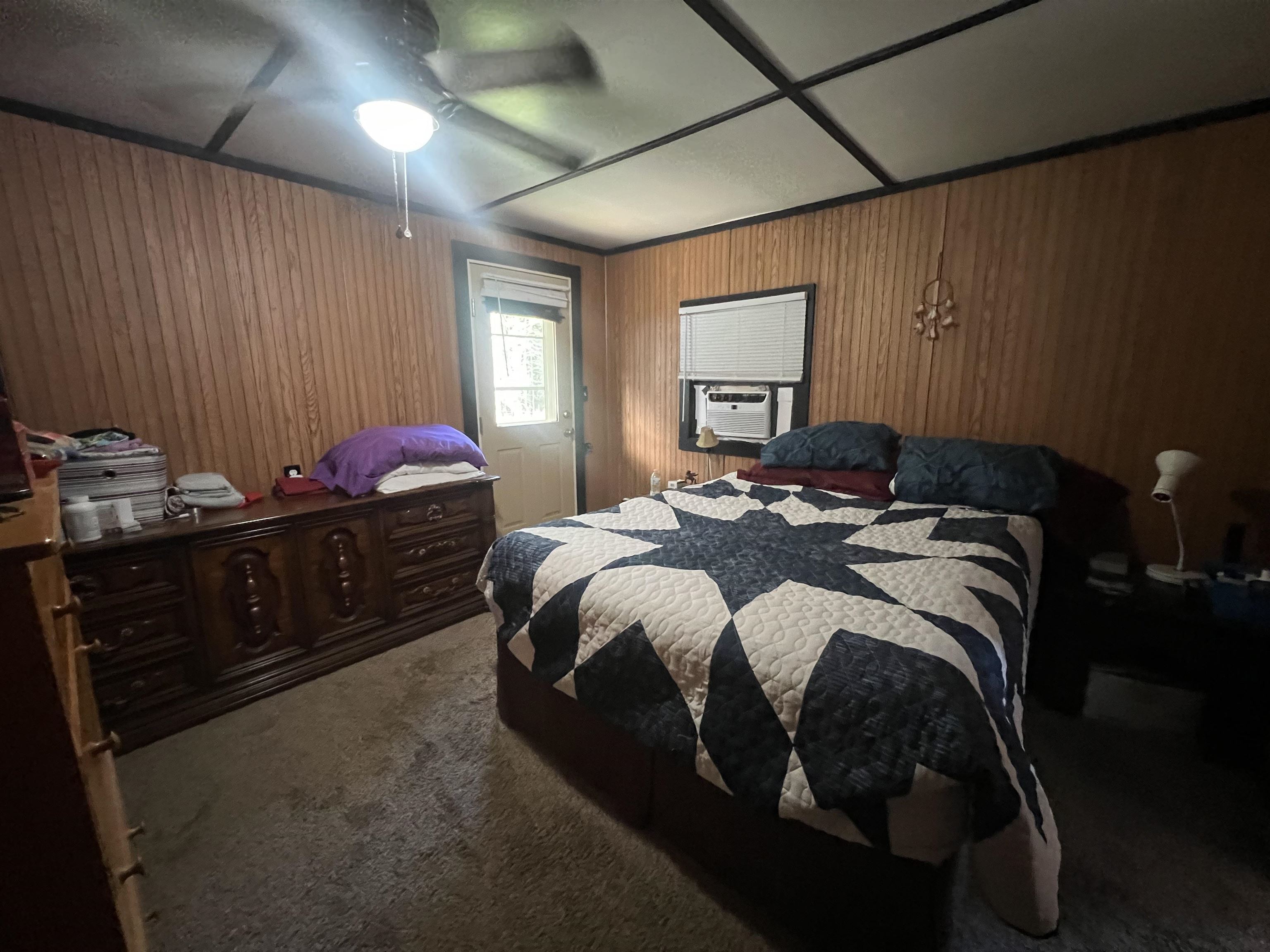 160 Finley Road Adamsville, TN 38310 - Photo 4 of 31 a bedroom with a bed and a closet