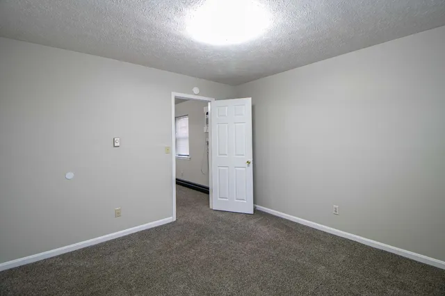 an empty room with an entryway